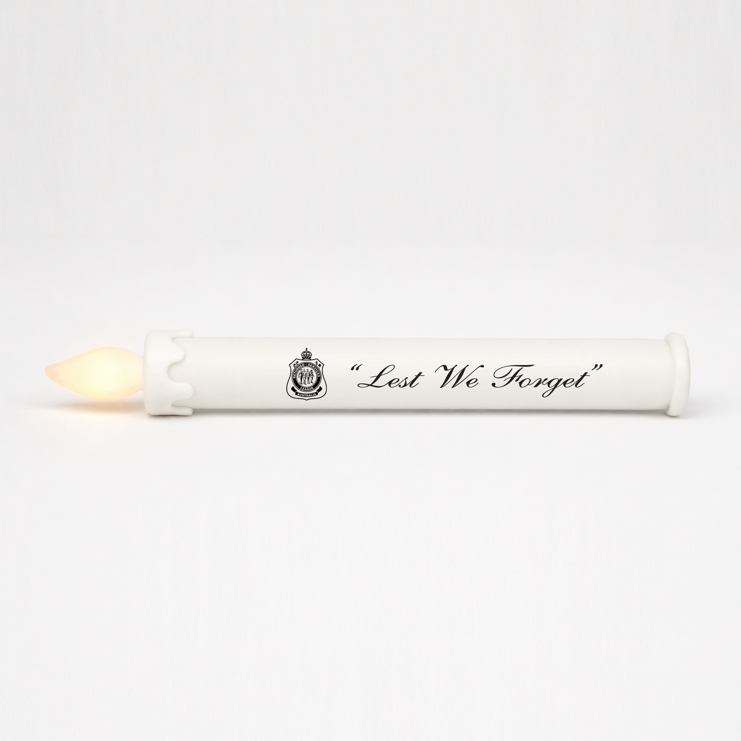 SafeFlame ANZAC Day LED taper candle printed with the official RSL logo and Lest We Forget