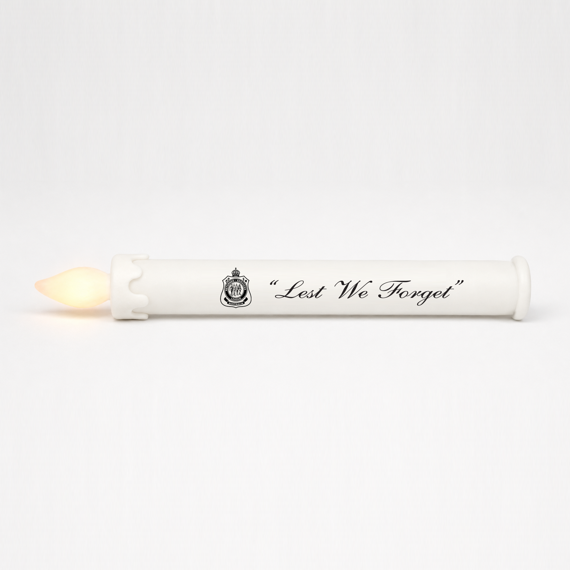 SafeFlame ANZAC Day LED taper candle printed with the official RSL logo and Lest We Forget