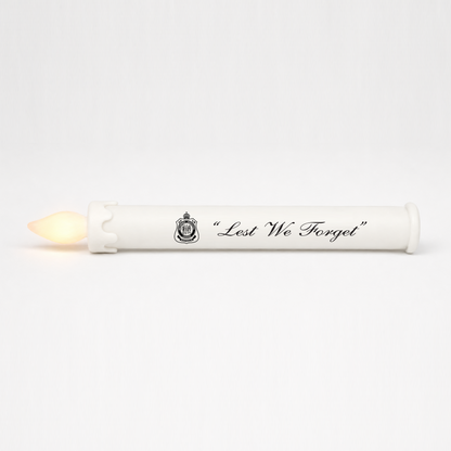 SafeFlame ANZAC Day LED taper candle printed with the official RSL logo and Lest We Forget