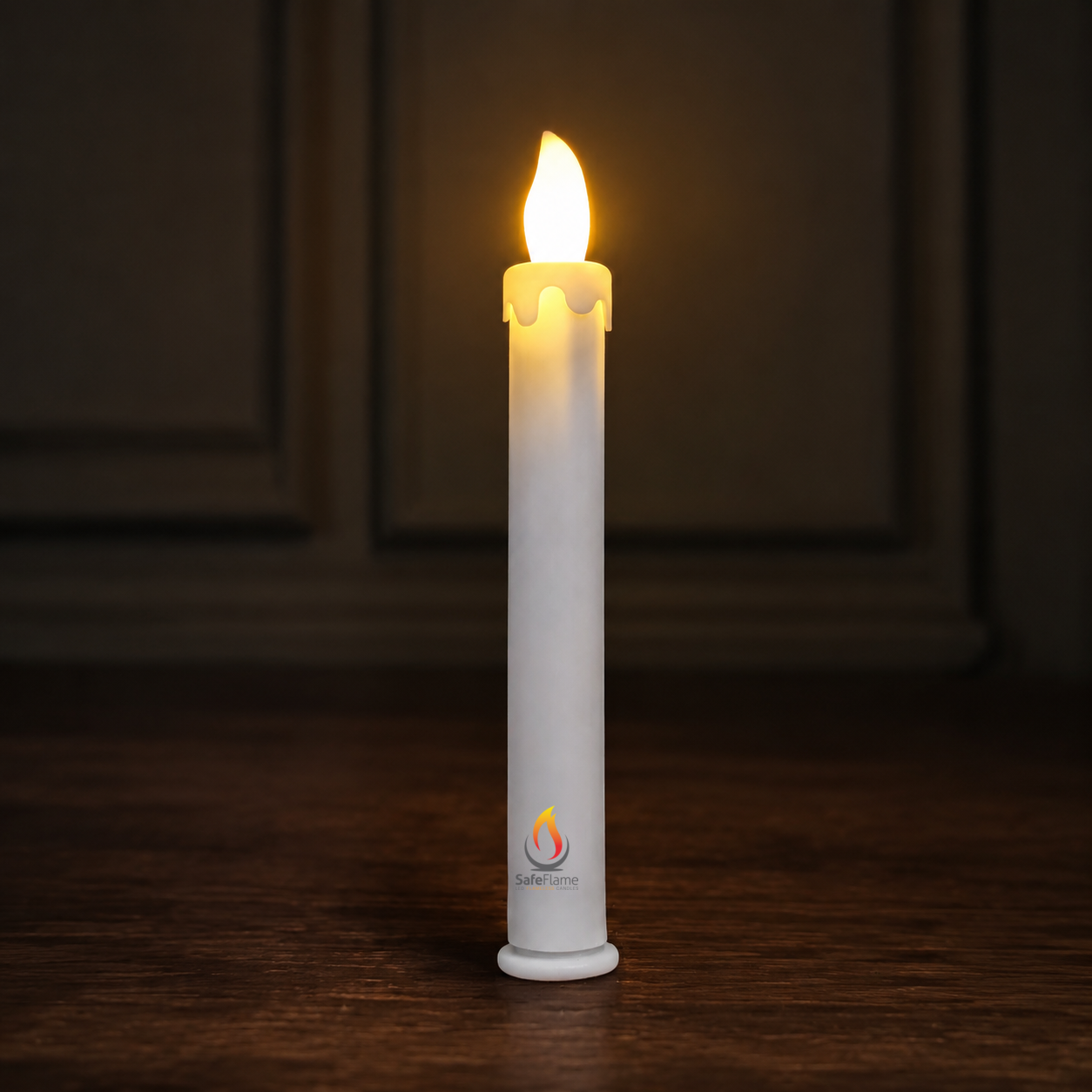 SafeFlame Classic warm LED taper candle on a dark wood table